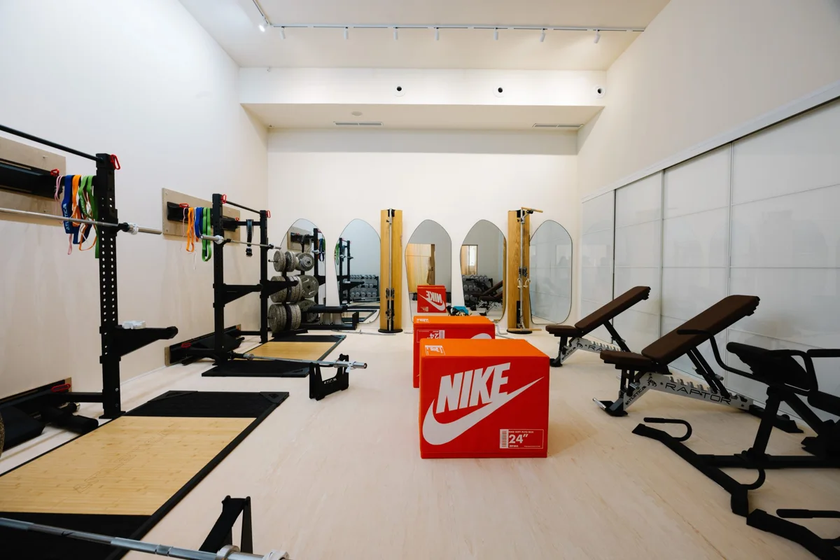 The Strength Lab with racks, benches and dumbbells